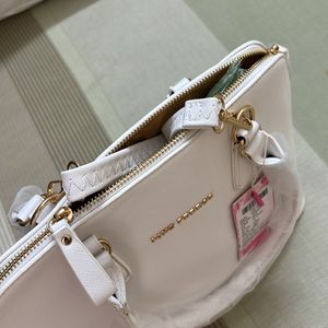 white hand bag