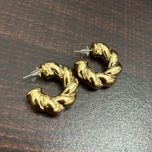 Curly Twisted Gold Statement Earrings