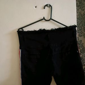 Black One Leg Knee Cut Jeans