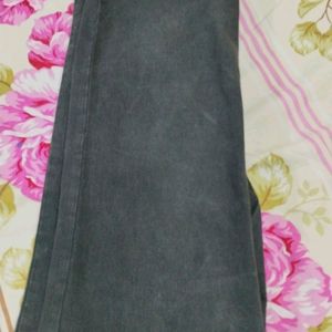 Black Jeans With Faded Pattern On Front