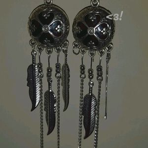 Silver Earrings In Black Effect