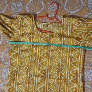 Beautiful yellow badhni print polyester kurti....N