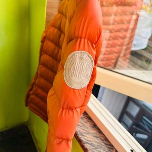 Orange puffer packable jacket