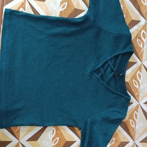 I am Selling A Dark Green Top .