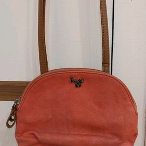 Baggit Leather sling Bag Coral Color With 2 Compar