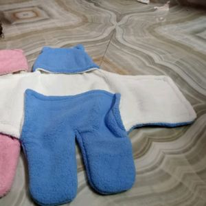 Baby Holding Clothes