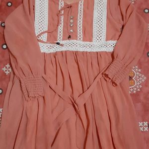 A Beautiful Peach Colour Frok Suit