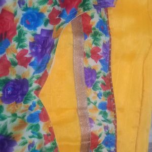 Bright Yellow Saree With Stitched Blouse