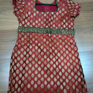 Lovely Kurti In Red Colour With Golden Butti