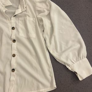 White Buttoned Puff Sleeved Shirt