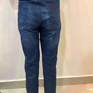 Dark blue mom fit jeans with Moti design