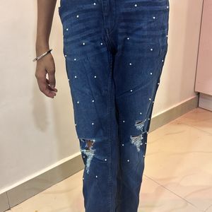 Dark blue mom fit jeans with Moti design