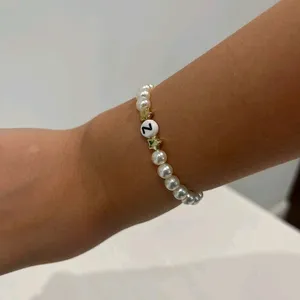 Elegant Pearl Bracelet with Star Charms 💌