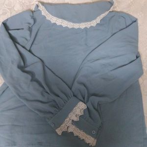 Work wear , nice faded blue lose blouse with lace collar, and sleeves white lace.