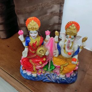 Gurunanak Photo And Laxmi Ganesh Idol