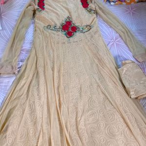 yellow gown suit with yellow pant and yellow net dupatta