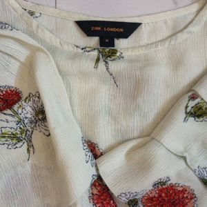 flower printed creamy blouson top