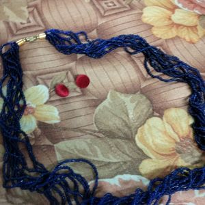 Blue Necklace And Red Velvet Earings.