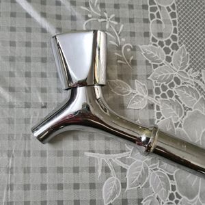 Chromium plated brass tap with extension pipe
