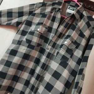 A Checkered Black And white Shirt With Full Sleeve