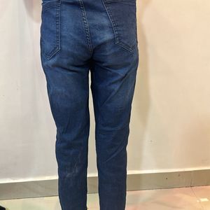 Dark blue mom fit jeans with Moti design