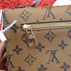 LOUIS VUITTON SLING BAG