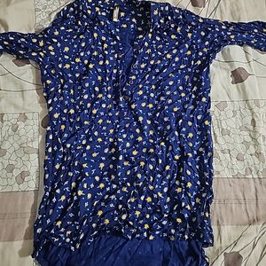 Its Navy Blue Top With White And Yellow Flowers