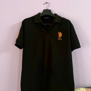 A Black Polo USPA Tshirt.