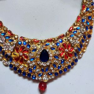 A Gorgeous Blue And Red Stone Work Necklace