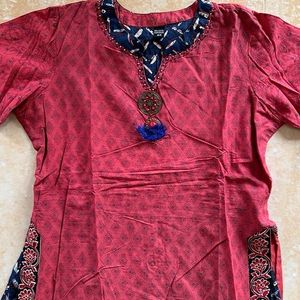 A light Festive Red Kurta Plazo Set