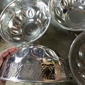 Four Stainless-steel Bowls