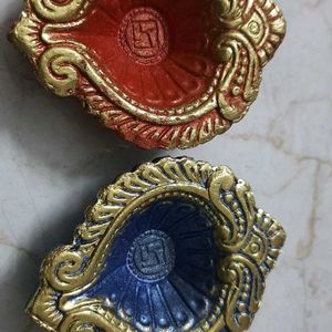 Diyas painted red ,blue ,gold,good for Diwali