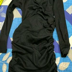 black mini bodycorn dress