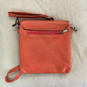 beautiful orange sling bag