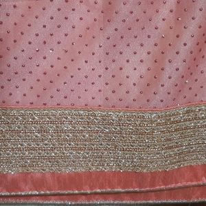 Beautiful Peachy Pink Saree with embroidery