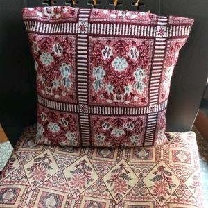 One Small Cushion And A Back Cushio