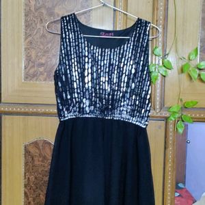 Black slip dress, ankle length. Regular fit party wear dress