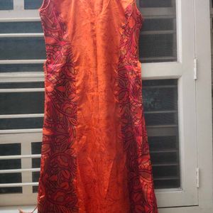 Orange Satin Gown For Women With Light Floral