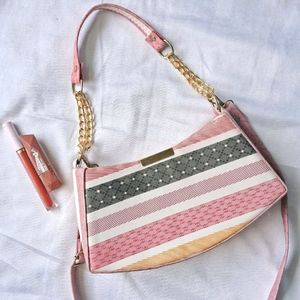 multi colour sling bag.