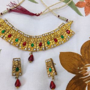 Golden Necklace With Red And Green Diamond