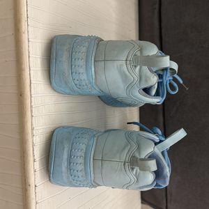Sky Blue Pair Of Shoes