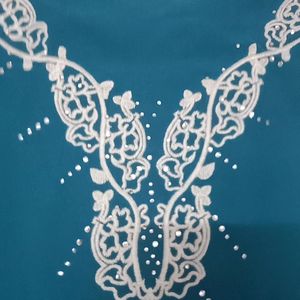 New Teal Tunic, pattern sleeves white embroidery