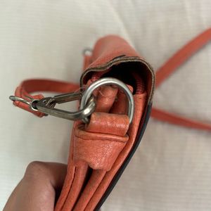 beautiful orange sling bag