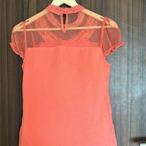 Pretty Peach Top With Yoke Embroidery Details