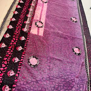 A Beautiful Pink Black Combination Floral Saree