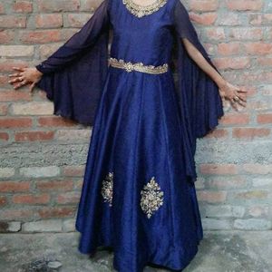 Festive Gown With Extended Cape Sleeves