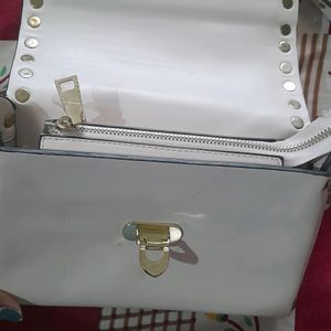 Cream Leather Exterior Bag.