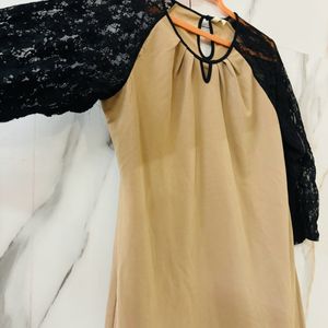 Beige Top With Black Net Sleeves