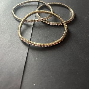 3 Bracelets And Three Earrings