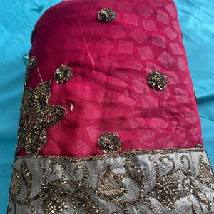 Red saree with golden zari work